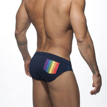 Load image into Gallery viewer, Pride Month Edition Swim Trunks with Rainbow Flag Speedos dark blue